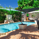 Modern backyard with a stylish pool, showcasing elegant landscaping and seating areas.